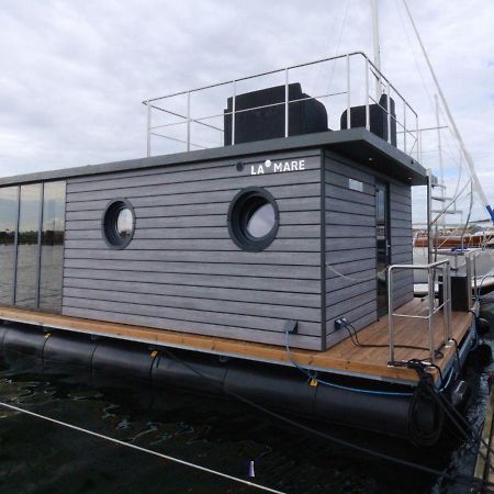 Hausboot Fjord Lacerta Mit Dachterrasse In Wendtorf Exterior photo