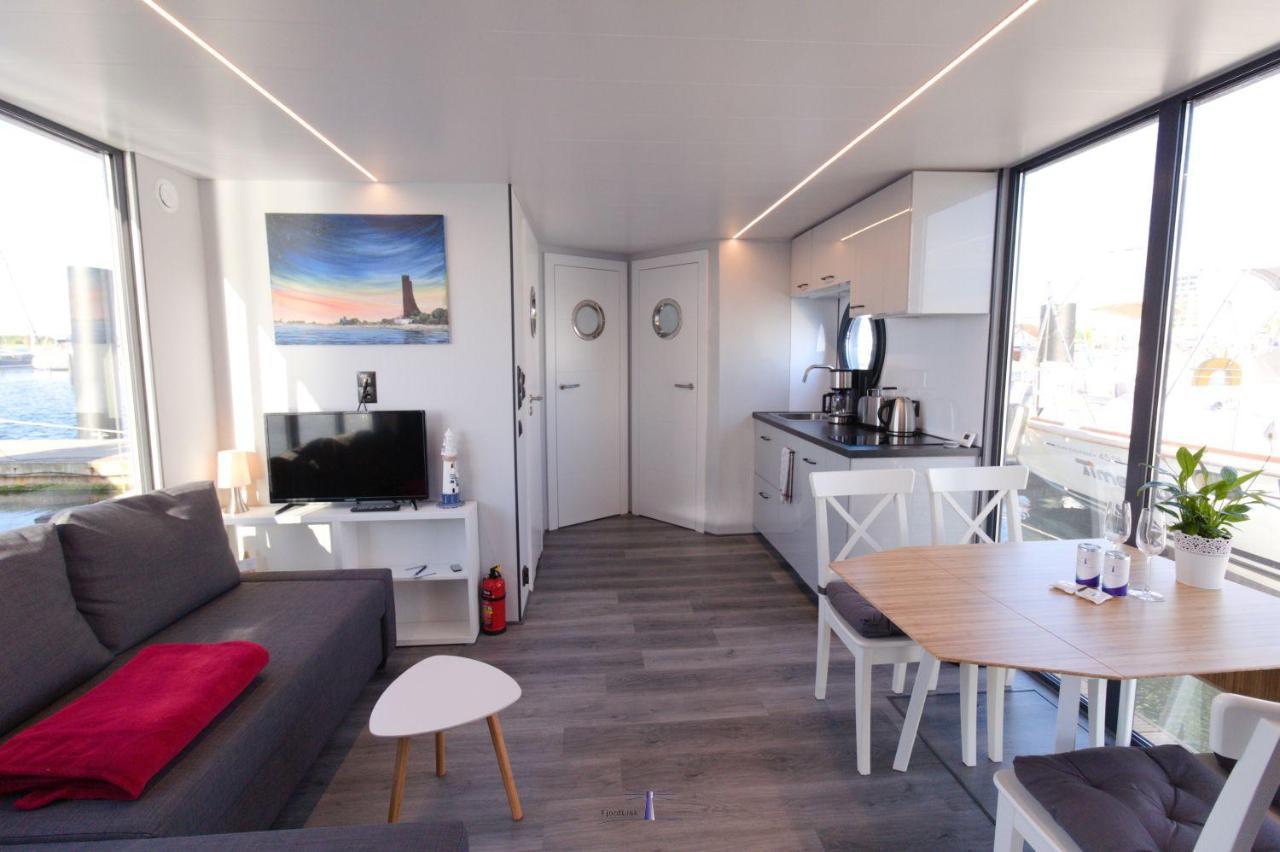 Hausboot Fjord Lacerta Mit Dachterrasse In Wendtorf Exterior photo